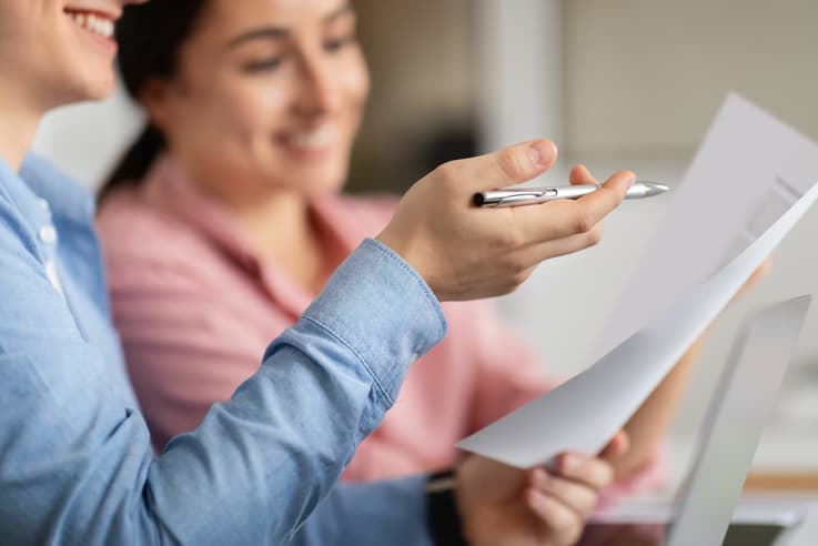 Specialists reviewing claim documentation