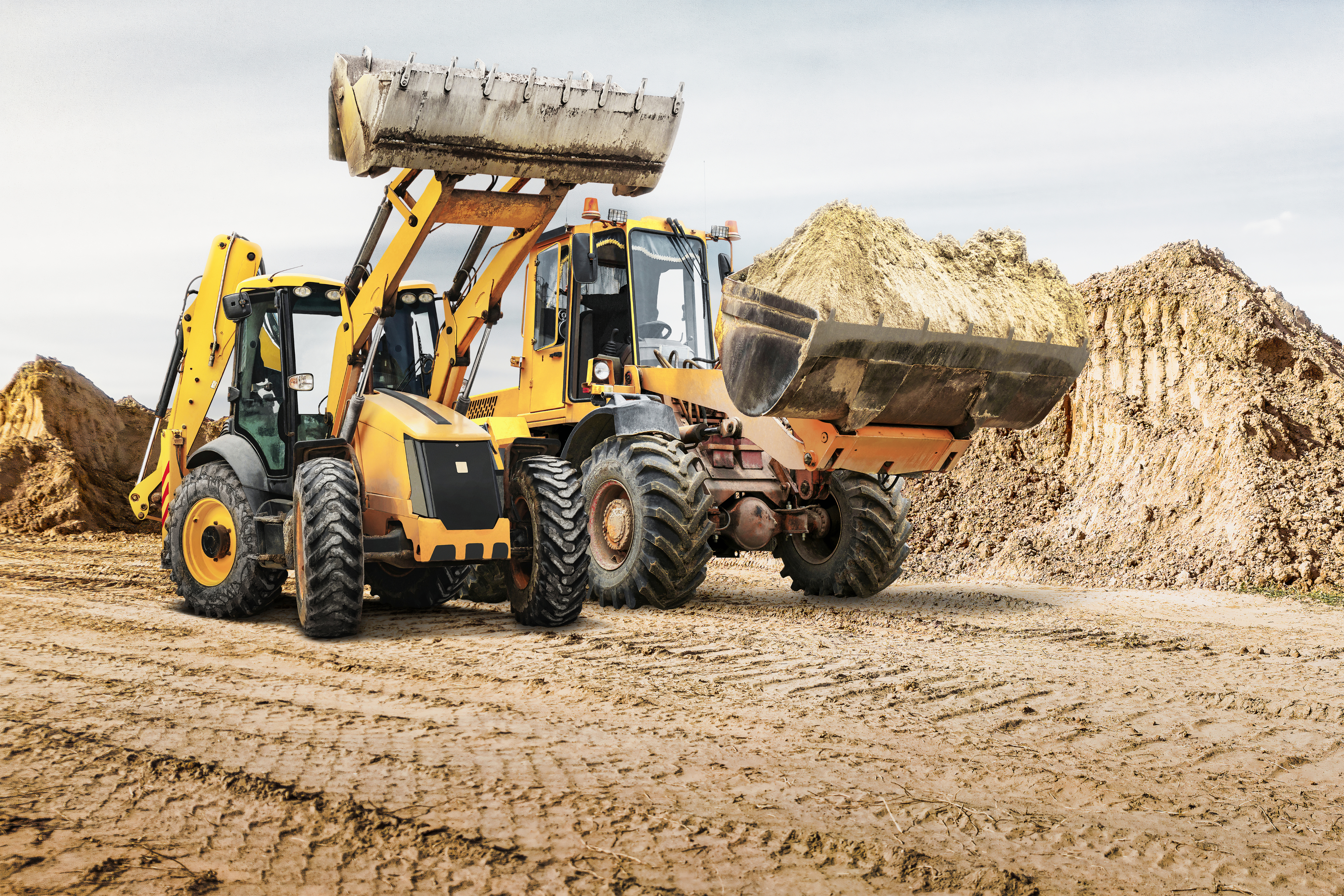 Dump trucks at a work site